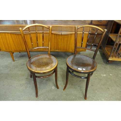 124 - A pair of early 20th Century beech bentwood chairs