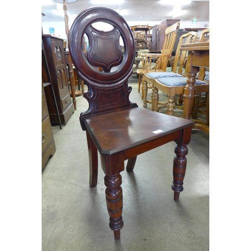 138 - A Victorian mahogany hall chair