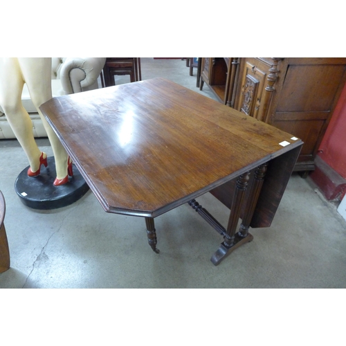 14 - A Victorian mahogany Sutherland table