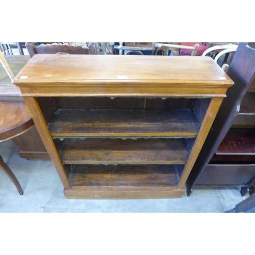 148 - A Victorian walnut open bookcase