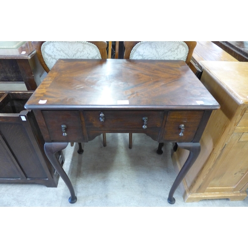 153 - A Queen Anne style mahogany lowboy