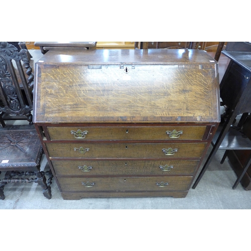 156 - A George III oak bureau