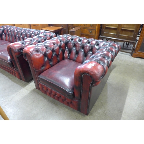 17 - An oxblood leather Chesterfield club chair