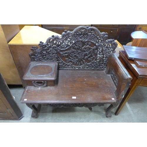 170 - A Burmese carved hardwood bench