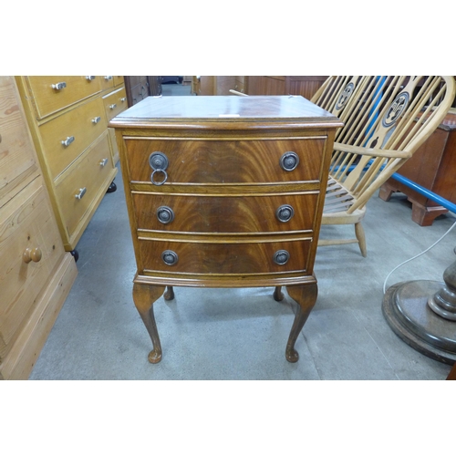 182 - A small mahogany bow front chest on stand