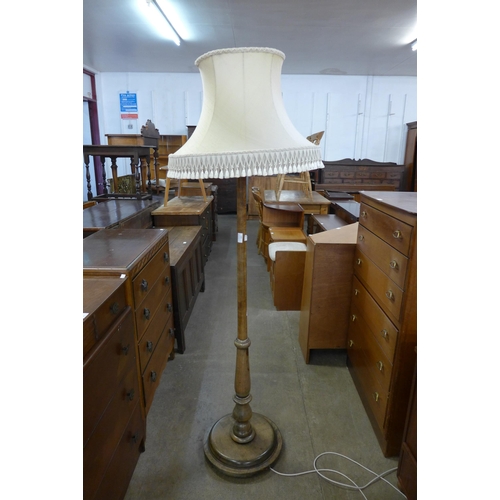 183 - A mahogany standard lamp