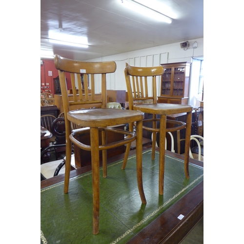 193 - A pair of beech bentwood chairs