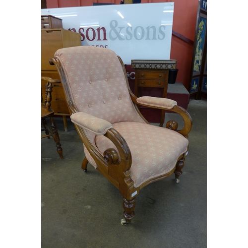 2 - A Victorian mahogany and fabric upholstered open armchair