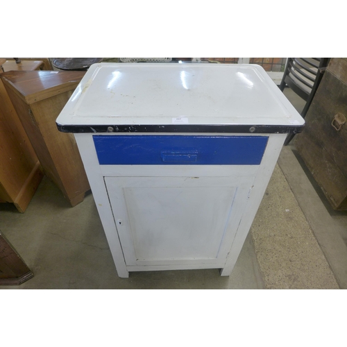 207 - An enameled top kitchen cabinet