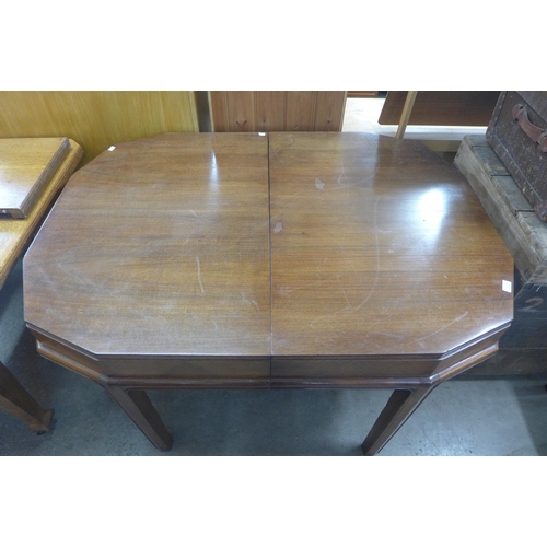 222c - An Art Deco style mahogany octagonal dining table