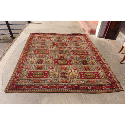 225 - An Axminster Ayrian patterned rug