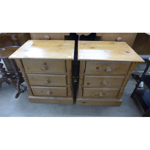 231 - A pair of pine bedside chests