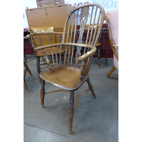 3 - A 19th Century elm highback Windsor chair