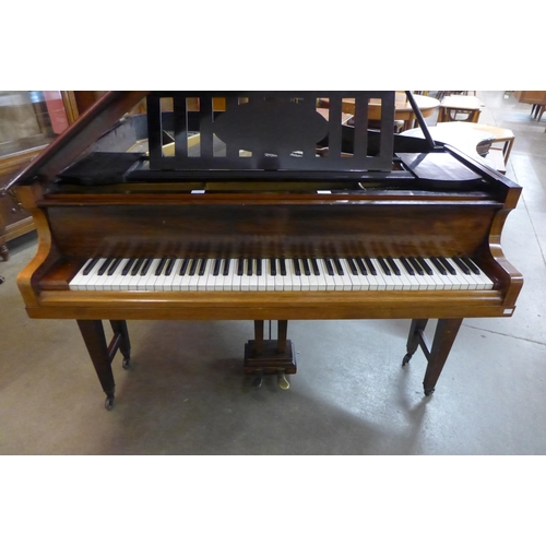 31 - A late 19th/early 20th Century rosewood baby grand piano, sold with non-transferable standard ivory ... 