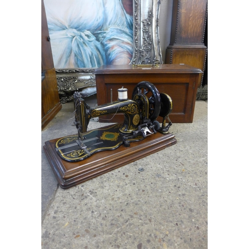 363 - A 19th Century cased Varley & Wolfenden sewing machine