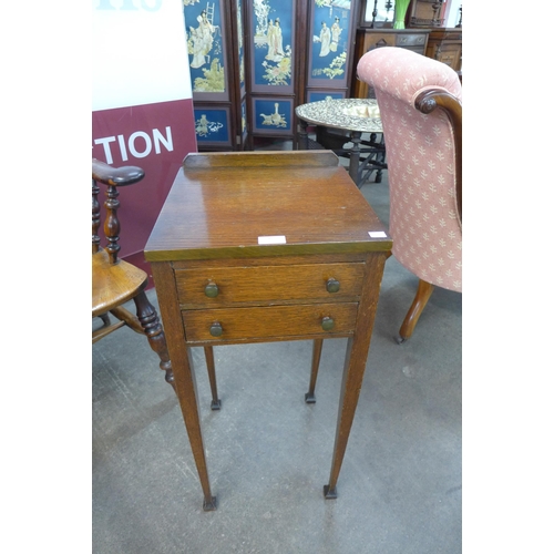 6 - An Art Deco Heals style oak two drawer night stand