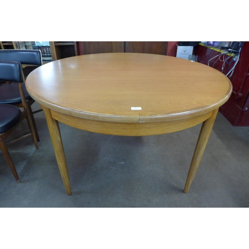 63 - A G-Plan Fresco teak extending dining table