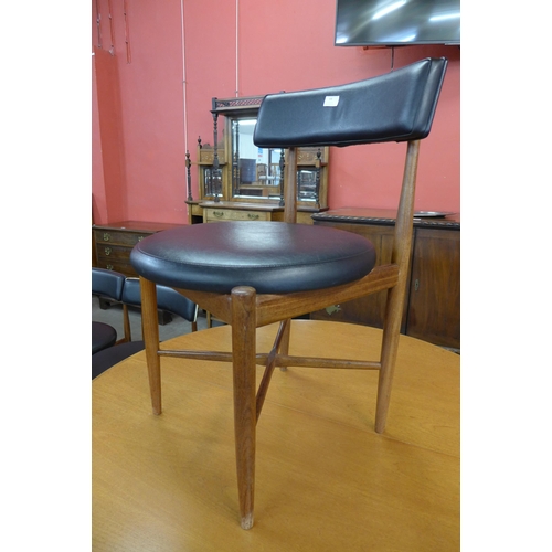 64 - A set of six G-Plan Fresco teak and black vinyl dining chairs