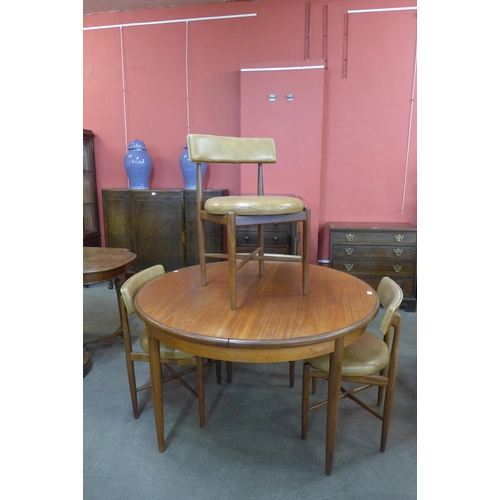 65 - A G-Plan Fresco extending dining table and four chairs