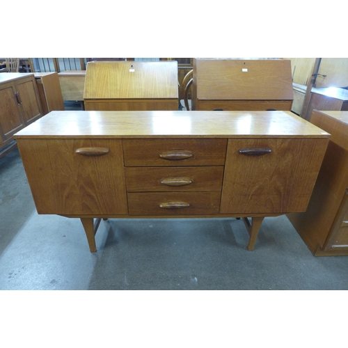 71 - A small teak sideboard