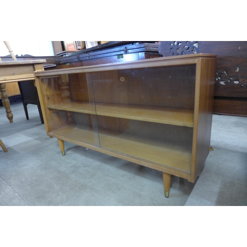 84 - A small tola wood bookcase