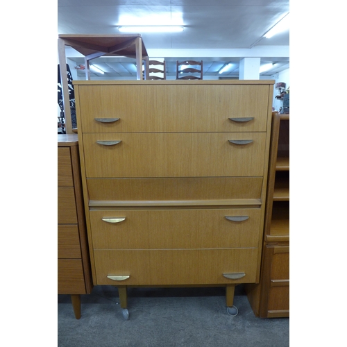 93 - A teak chest of drawers