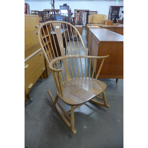 97 - An Ercol Blonde elm and beech Chairmakers armchair