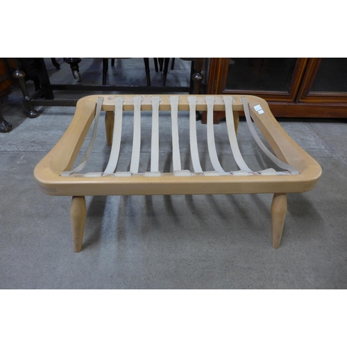 98 - An Ercol Blonde beech footstool