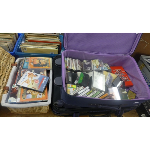 2104 - Picnic basket and 2 useable suitcases with approx 80 cassette tapes and 180CDs and DVDs