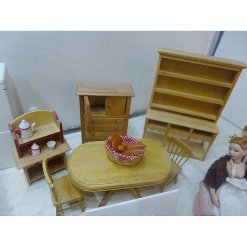 2185 - Approx 40 items of dolls house furniture in red leather-effect storage box