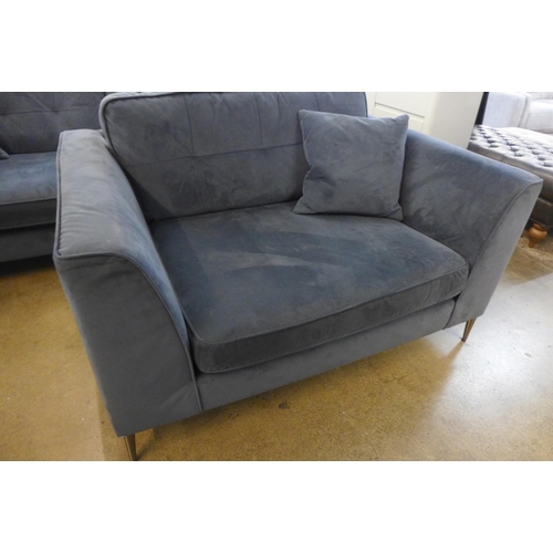 1312 - A space blue velvet and pinched back cushioned four seater sofa and loveseat