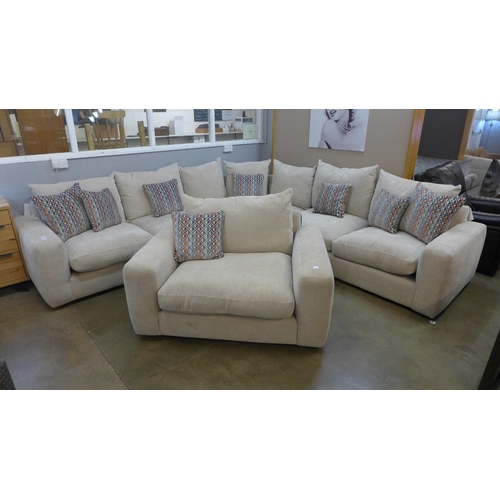 1333 - A Champagne upholstered corner sofa and loveseat with a set of scatter cushions