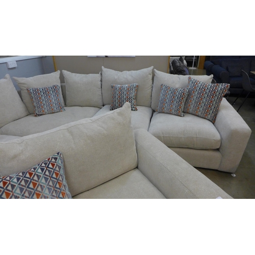 1333 - A Champagne upholstered corner sofa and loveseat with a set of scatter cushions