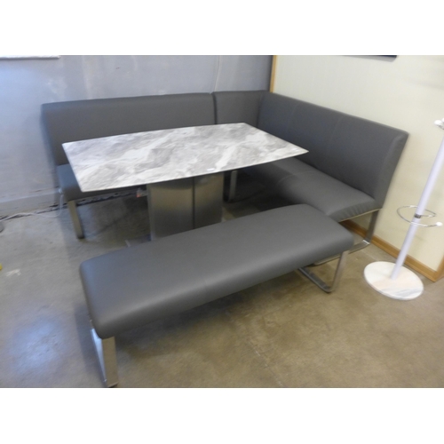 1359 - A Saturn fixed top marble and chrome display table with a grey leather effect bench set