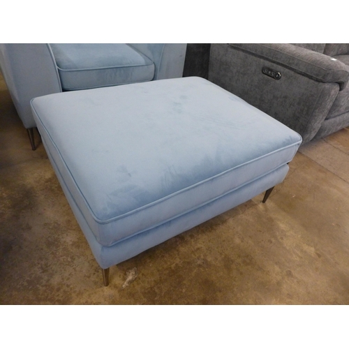 1443 - A sky blue velvet oversized armchair with footstool