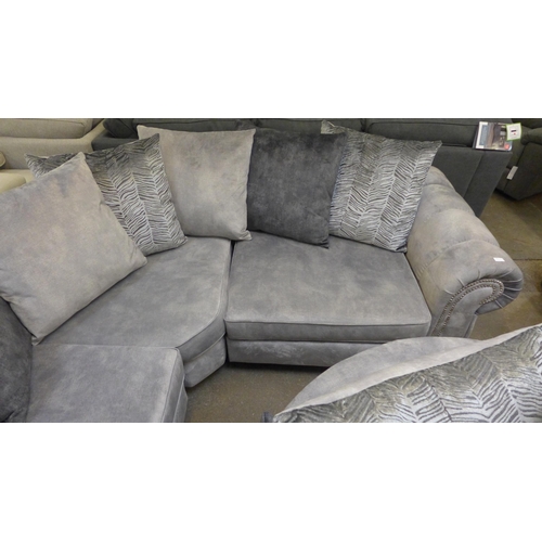 1470 - A Dynasty silver upholstered and studded corner sofa and swivel loveseat with footstool * This lot i... 