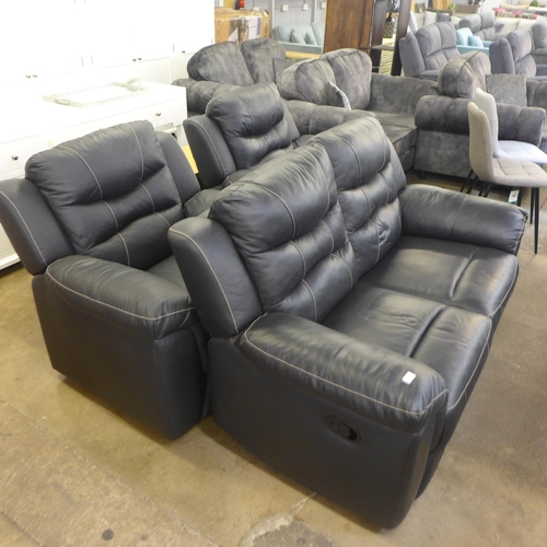 1477 - An Axel black leather effect manual reclining two seater sofa and a pair of static armchairs * This ... 