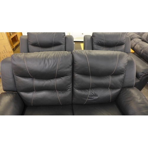 1477 - An Axel black leather effect manual reclining two seater sofa and a pair of static armchairs * This ... 