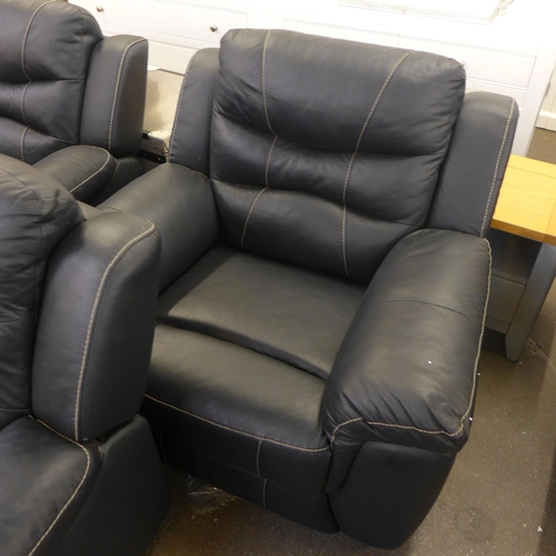 1477 - An Axel black leather effect manual reclining two seater sofa and a pair of static armchairs * This ... 