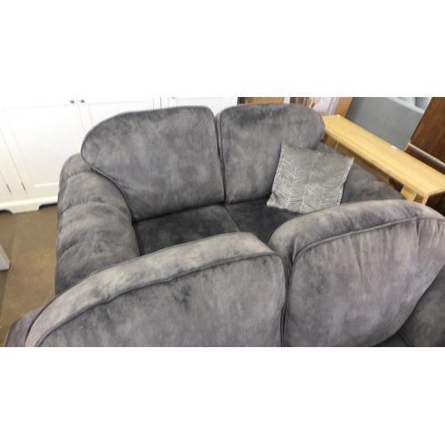 1479 - A pair of Dynasty charcoal upholstered and studded two seater sofas and loveseat * This lot is subje... 