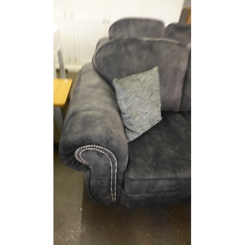 1479 - A pair of Dynasty charcoal upholstered and studded two seater sofas and loveseat * This lot is subje... 