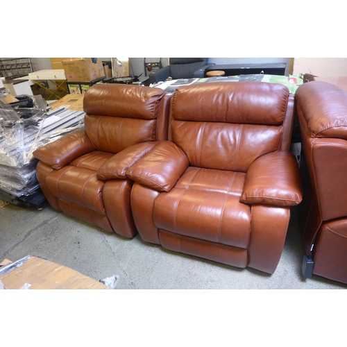 1572 - A set of four brown leather reclining armchairs