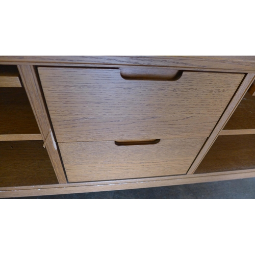 1598 - A light oak media unit