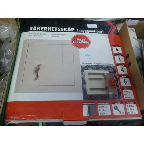 2010 - Wall safe in box with keys