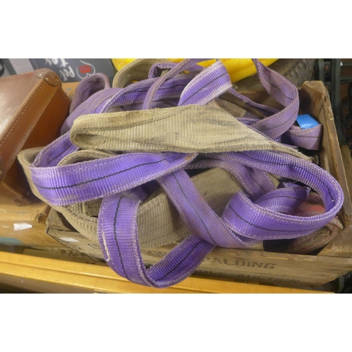 2243 - Crate of lifting straps, Ford transit van wheel and reel of yellow ducting/flexible 40mm conduit pip... 