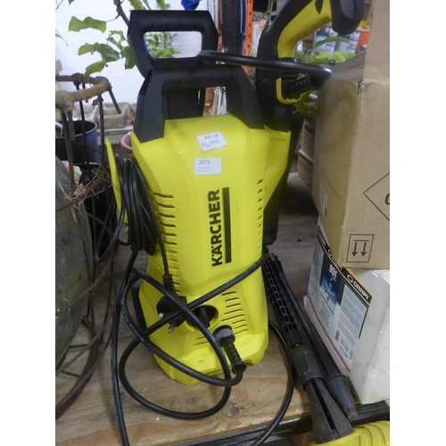 2073 - Karcher jetwash with two attachments and floor scrubber