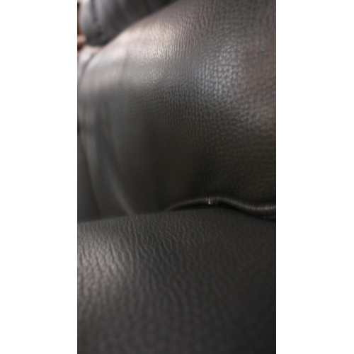 1302 - A grey leather 2.5 seater power recliner