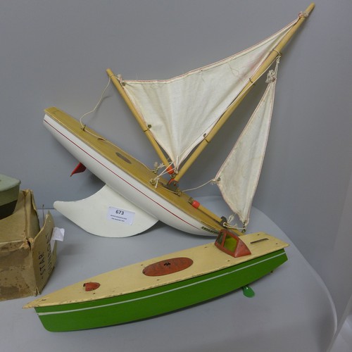 673 - A boxed Star clockwork gunboat, a Star speedboat and a Star yacht