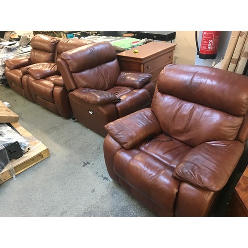 1572 - A set of four brown leather reclining armchairs