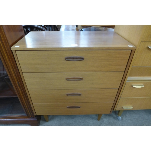 17 - A teak chest of drawers